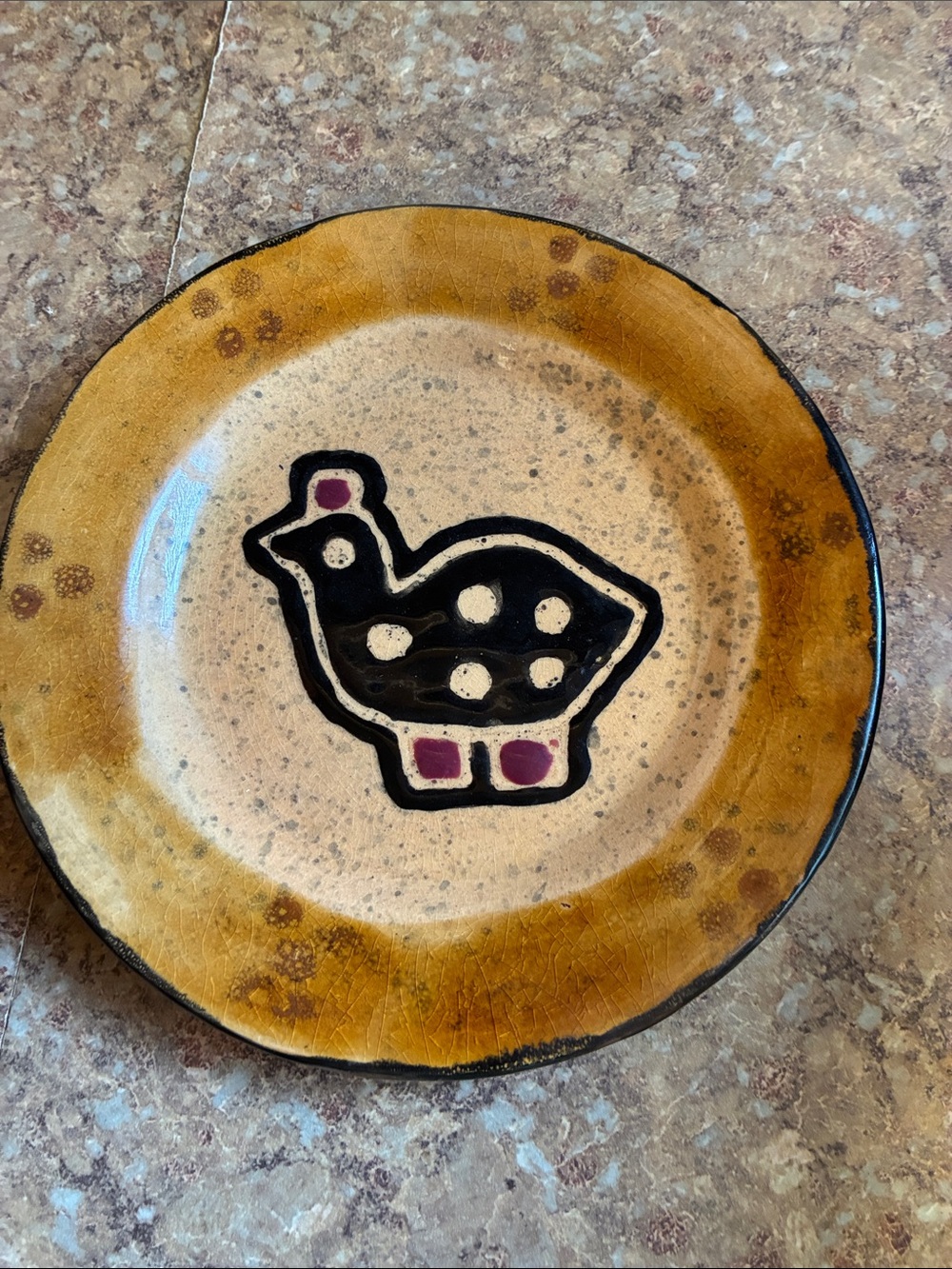 Handmade Ceramic Plate with Yellow Rim and Black Bird Design
